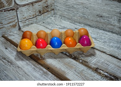 Easter tradition - Easter colorful chicken eggs on a gray background - Easter composition. - Selective focus