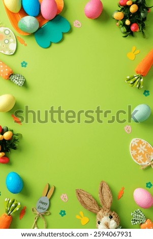 Easter vertical background. Frame border of Colorful painted Easter eggs, bunny, festive decoration, on vibrant green background. Easter banner design, poster template. Top view.