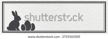 Easter website header banner with black bunny and eggs silhouette on white textured paper background with copy space.