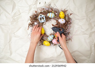 Easter Wreath Hand Made. Colored Eggs And Chickens Home Decoration Glue Gun. DIY High Quality Photo