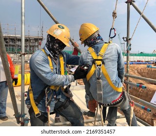 Eastern, Thailand - 17 June 2022: Worker Is Rescued From Manhole During Working On Confined Space By Safety Tripod, Fainting.