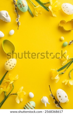 Easter-themed vertical composition with delicate decorated eggs, daffodil flowers, and yellow background. Ideal for seasonal celebrations, spring themes
