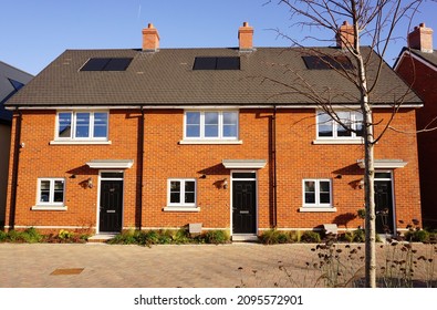 Eastleigh, Hampshire, England - 11.22.2021 : Small New Build Houses In Borough Of Eastleigh. Terraced Family Homes In Newly Developed Housing Estate. Property Market Photo.