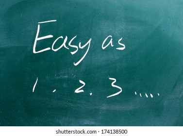 Easy As 1 2 3 Phrase Written On A Chalkboard