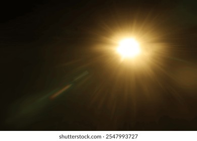 Easy to add lens flare effects for overlay designs or screen blending mode to make highquality images Abstract sun burst digital flare iridescent glare over black background