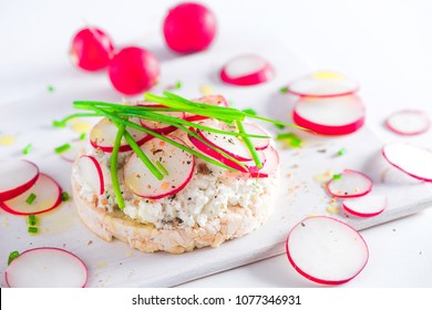 Easy Breakfast Concept With Crisp Bread, Radish Slices, Scallion, Cottage Cheese And Pepper. Healthy Snack In High Key With Copy Space.