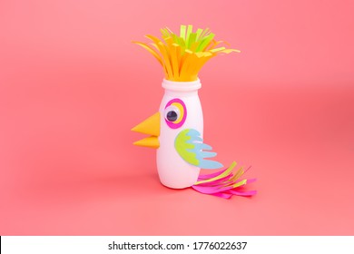 Easy Parrot Craft From Paper And Recycled Yogurt Bottle, DIY . Kindergarten Or School, Creative Craft Project Ideas, Pink Background