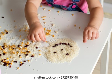 Easy Sensory Activities For Babies Toddler, Preschoolers. Little Girl Hands Playing With Rice, Popcorn, Beans, Pasta. Sensory Play At Home, Games For Sensory Processing Disorder, Activities Montessori