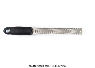 The easy-to-use grater with a razor-sharp stainless steel blade that does not rust, non-slip handle. Grater for cheese, lemon, ginger, accessories for garlic, kitchen. on a white background. isolate.