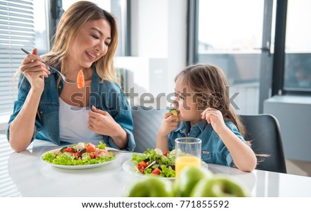 Similar – Image, Stock Photo mom Nutrition Lifestyle