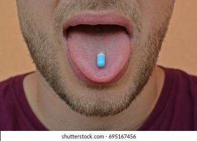 eat pills - Shutterstock ID 695167456