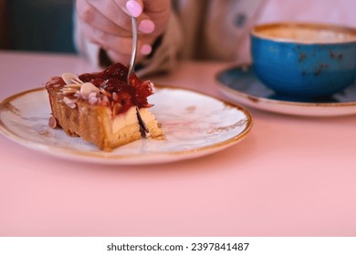 Eating Bite Of Raspberry Tart Cake. Eat Delicious Sweet Dessert. Pastry In Restaurant, Cafe. Cutting Creamy Texture Closeup. Person Taking Bite Slice of Shortcrust Cake. Breaks Off Piece of Berry Cake