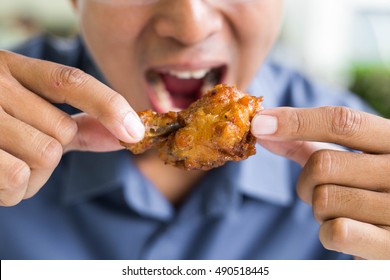 Eating Delicious Fried Chicken Wing