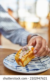 Eating A Delicious Mini Lobster Roll In A Restaurant. Best Way To Hold A Lobster Roll With Hands.