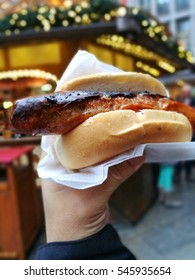 Eating Delicious Traditional German Sausage Sandwich