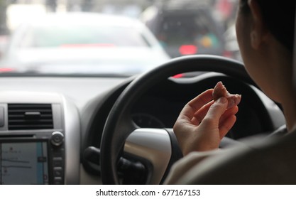 479 Eating during driving Images, Stock Photos & Vectors | Shutterstock