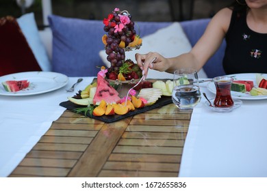 eating fruit on the table
