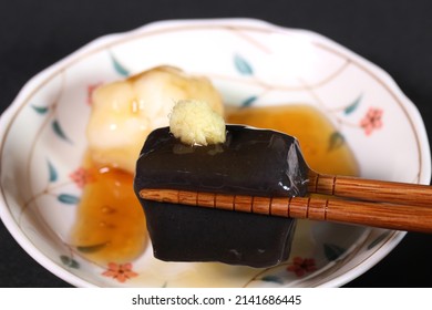 Eating Goma-dofu ( Japanese 
Traditional Food, Sesame Tofu )