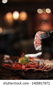 Eating Grilled Boston Lobster Meat