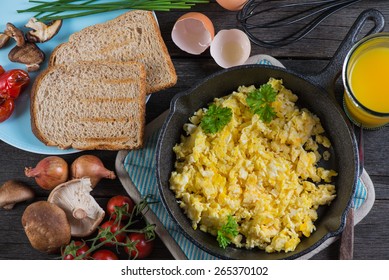 Eating Healthy Breakfast,scrambled Egg With Wholegrain Toast And Orange Juice