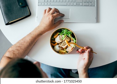 Eating Healthy Lunch Bowl In Man' S Hands. Home Office, Food Delivery, Dieting, Detox, Vegetarian Food Concept. Top View