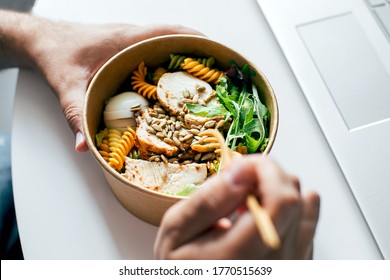 Eating Healthy Lunch Bowl In Man's Hands. Delicious Balanced Food Concept. Felivery Food, Home Office, Dieting, Detox, Vegetarian Food Concept