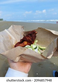 Eating Nasi Kukus At The Beach.