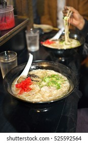 Eating Ramen Noodles Called Yatai At Mobile Food Stall In Fukuoka, Kyushu, Japan