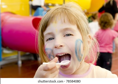 Eating Spoon Funny Girl Playground Smiling Blond Open Mouth