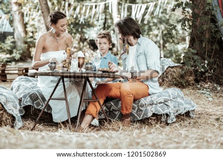 Similar – Image, Stock Photo Woman eating piece of cake in summer party