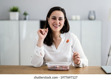 Eating Virtual Lunch. Business Woman Tasting Food