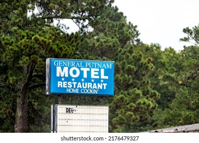 Eatonton, USA - October 5, 2021: Sign Closeup In Eatonton, Georgia For General Putnam Motel And Restaurant Home Cooking Hotel In Blue Color For Permanantly Closed Burned Down Business