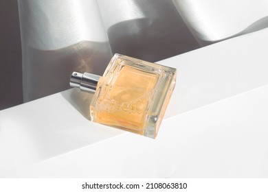 eau de parfum, the perfume fragrance cosmetic mockup, luxury product branding, on white background, bottle container glass
