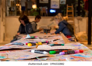 Ebeltoft, Denmark - 20 July 2020: Children And Adults Draw With Colors On A Long Piece Of Paper, Joint Drawing, Drawing Toads, Kulturhuset Ebeltoft, The Malt Factory