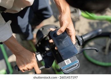 E-Bike Accessibility and Smart Solutions. A user engages with an e-bike app for sustainable transportation right from the bike.