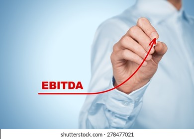 EBITDA (Earnings before interest, taxes, depreciation, and amortization) increase concept. Businessman draw graph with growing EBITDA.