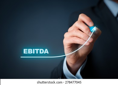 EBITDA (Earnings before interest, taxes, depreciation, and amortization) growth concept. Businessman draw graph with growing EBITDA.
