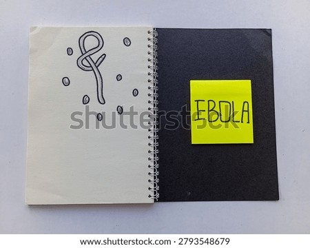 Ebola note attached to a notebook symbolizing disease awareness, healthcare preparedness, and scientific investigation.