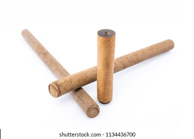 Ebonite Stick On White Background, With Shadows. Also Is Known As Hard Rubber Or Vulcanite