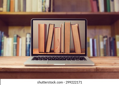 E-book Library Concept With Laptop Computer And Books