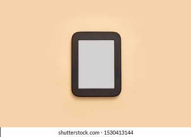 Ebook Mockup With Empty Screen On Beige Background. Top View Flat Lay. Student Or School Library