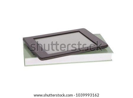 Ebook reader tablet with blank screen and a green paper book. Isolated on white.