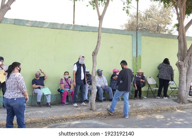                              ECATEPEC DE MORELOS, MÉXICO - 23 FEBRUARY 2021:  Older Adults Sitting In Line To Be Vaccinated Against Covid-19 At The Melchor Muzquiz Civic Center In Ecatepec De Morelos