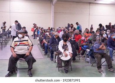                                ECATEPEC DE MORELOS, MÉXICO, 24 FEBRUARY 2021: Older Adults Sitting In The Melchor Muzquiz Civic Center Waiting To Be Vaccinated