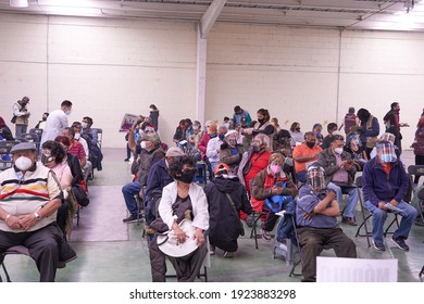 ECATEPEC DE MORELOS, MÉXICO, 24 FEBRUARY 2021: Older Adults Sitting In The Melchor Muzquiz Civic Center Waiting To Be Vaccinated