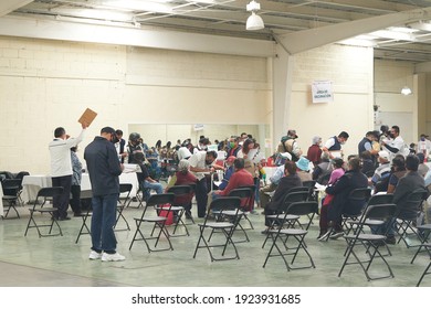 ECATEPEC DE MORELOS, MÉXICO, 24 FEBRUARY 2021: Older Adults Sitting In The Melchor Muzquiz Civic Center Waiting To Be Vaccinated