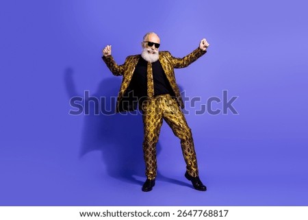 Eccentric elder in a stylish patterned suit dancing confidently with energy against a vibrant purple background