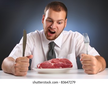 Eccentric Guy Eating Red Meat