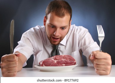 Eccentric Guy Eating Red Meat