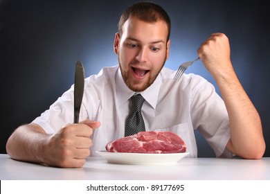 Eccentric Guy Eating Red Meat